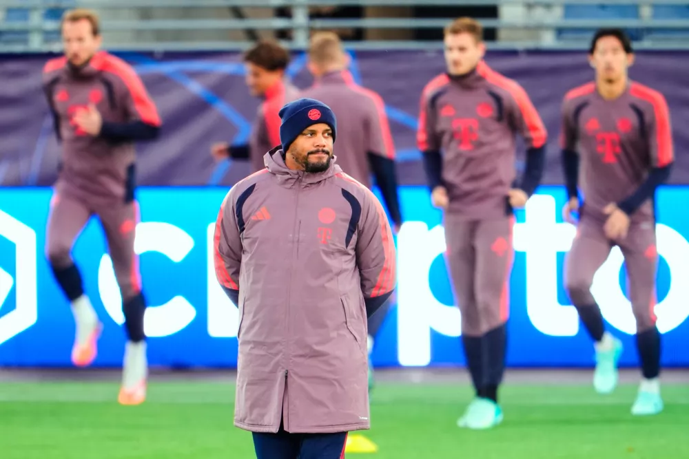 FILE - Bayern Munich's head coach Vincent Kompany, front, attends a training session in Stavanger, Norway, Monday, Oct. 12, 2026, ahead of the Champions League soccer match between Viking Stavanger and FC Bayern Munich. (Lise Aserud/NTB Scanpix via AP, File)