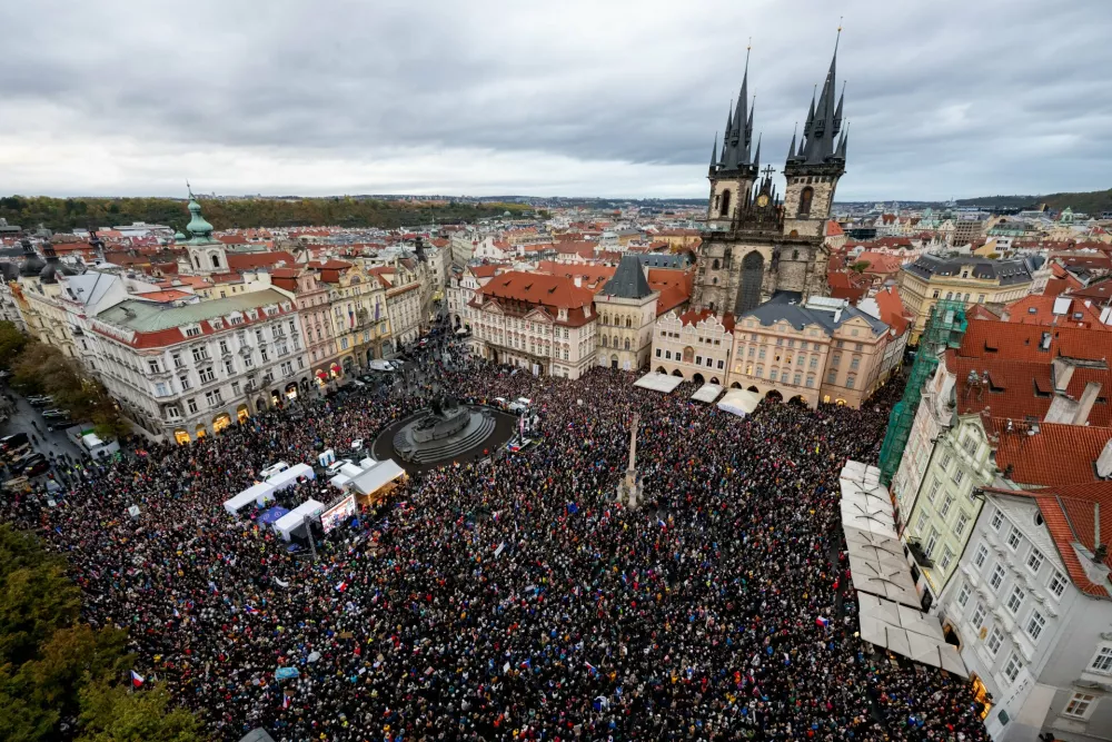 People attend a protest entitled "Hands Off the Media!" staged by Million Moments for Democracy group, on the Old Town Square in Prague, Czech Republic, Sunday, Oct. 25, 2026.&nbsp; (Ondrej Deml/CTK via AP)