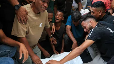 Mourners react during the funeral of three Palestinians who were killed in an Israeli strike, according to medics, at Al-Shifa Hospital in Gaza City, October 25, 2026. REUTERS/Dawoud Abu Alkas