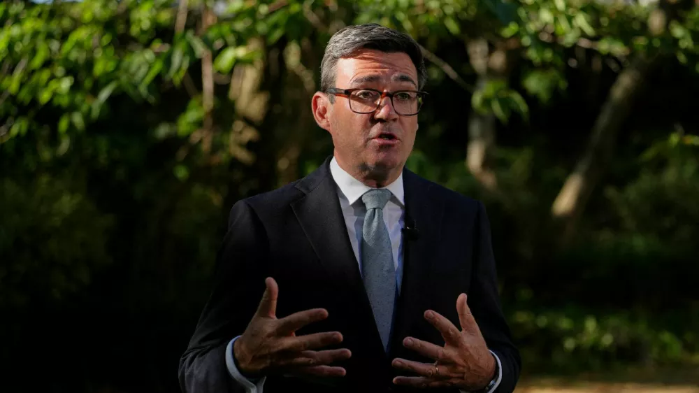 FILE PHOTO: Britain's Prime Minister Andy Burnham speaks to the media after chairing a COBR meeting at Downing Street on the UK's ongoing response to extreme heat, wildfires and drought, in London, Britain, Wednesday, Aug. 12, 2026.  Kin Cheung/Pool via REUTERS/File Photo