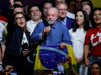 Brazilian President Luiz Inacio Lula da Silva, the Workers' Party (PT) candidate for presidential re-election, speaks alongside his wife, Rosangela "Janja" da Silva, and Vice President Geraldo Alckmin after winning the presidential runoff election, in Sao Paulo, Brazil, October 25, 2026. REUTERS/Brian Snyder