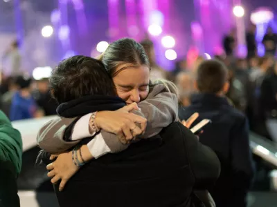 Supporters of the electoral list "Student List - Students Win" celebrate after Aleksandar Vucic, Serbian Progressive Party (SNS) prime ministerial candidate, conceded defeat in the parliamentary election in Belgrade, Serbia, October 26, 2026. REUTERS/Uros Arsic