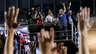 Brazil's President Luiz Inacio Lula da Silva, the Workers' Party (PT) candidate for re-election, alongside Vice President Geraldo Alckmin, gestures as he addresses supporters after his victory in the presidential runoff election, at Paulista Avenue, in Sao Paulo, Brazil, October 26, 2026. REUTERS/Amanda Perobelli