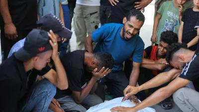 Mourners react during the funeral of three Palestinians who were killed in an Israeli strike, according to medics, at Al-Shifa Hospital in Gaza City, October 25, 2026. REUTERS/Dawoud Abu Alkas
