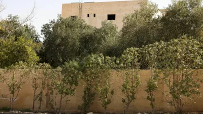 A building shows signs of gunfire at the site where Jordanian security forces arrested three suspects in connection with the deadly church shooting, in the Al-Judayyda area of Karak, Jordan, October 26, 2026. REUTERS/Alaa Al Sukhni
