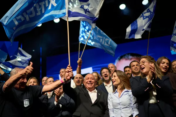 Gadi Eisenkot, leader of the Yashar ("Straight") party, waves an Israeli flag after speaking at a campaign rally ahead of the country's general election, Sunday, Oct. 25, 2026, in Tel Aviv, Israel. (AP Photo/David Goldman)