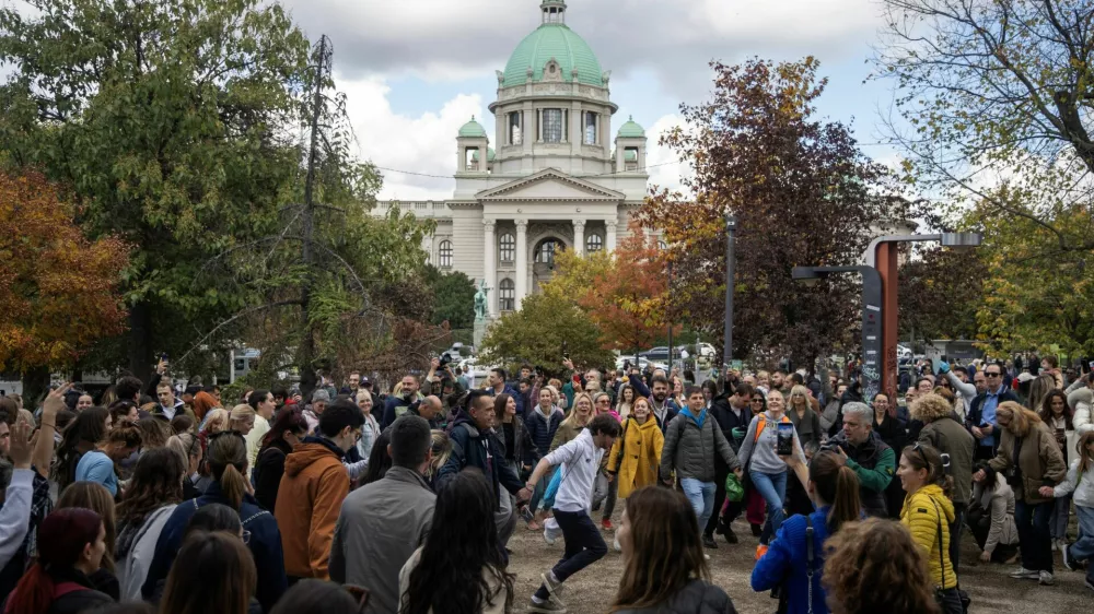 People dance at Pionirski Park, the site of a former government-backed counter-encampment, in Belgrade, Serbia, October 26, 2026. REUTERS/Mitar Mitrovic