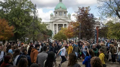 People dance at Pionirski Park, the site of a former government-backed counter-encampment, in Belgrade, Serbia, October 26, 2026. REUTERS/Mitar Mitrovic