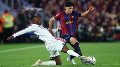 Soccer Football - LaLiga - FC Barcelona v Real Madrid - Spotify Camp Nou, Barcelona, Spain - October 25, 2026 FC Barcelona's Xavi Espart in action with Real Madrid's Yan Diomande REUTERS/Albert Gea