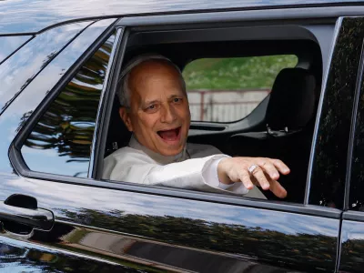 FILE PHOTO: Pope Leo reacts while sitting in a car as he leaves Gemelli Hospital following his lung surgery and cancer diagnosis, in Rome, Italy, October 17, 2026. REUTERS/Remo Casilli/File Photo