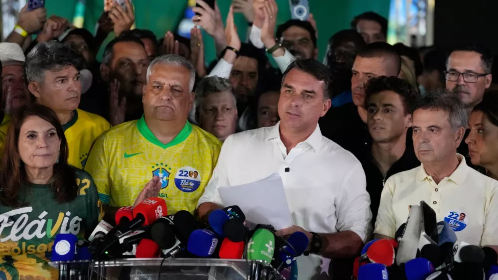 FILE - Opposition presidential candidate Sen. Flavio Bolsonaro speaks after the presidential election runoff in Brasilia, Brazil, Oct. 25, 2026. (AP Photo/Eraldo Peres, File)