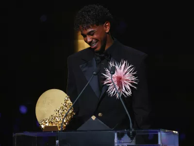Soccer Football - Ballon d'Or - London Palladium, London, Britain - October 26, 2026 FC Barcelona's Lamine Yamal celebrates after winning the men's young talent of the year award Action Images via Reuters/Matthew Childs