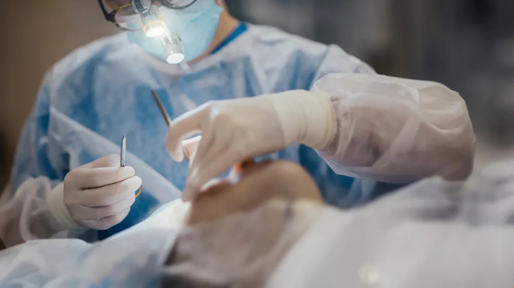 plastic surgery, facial correction in the clinic. Teamwork