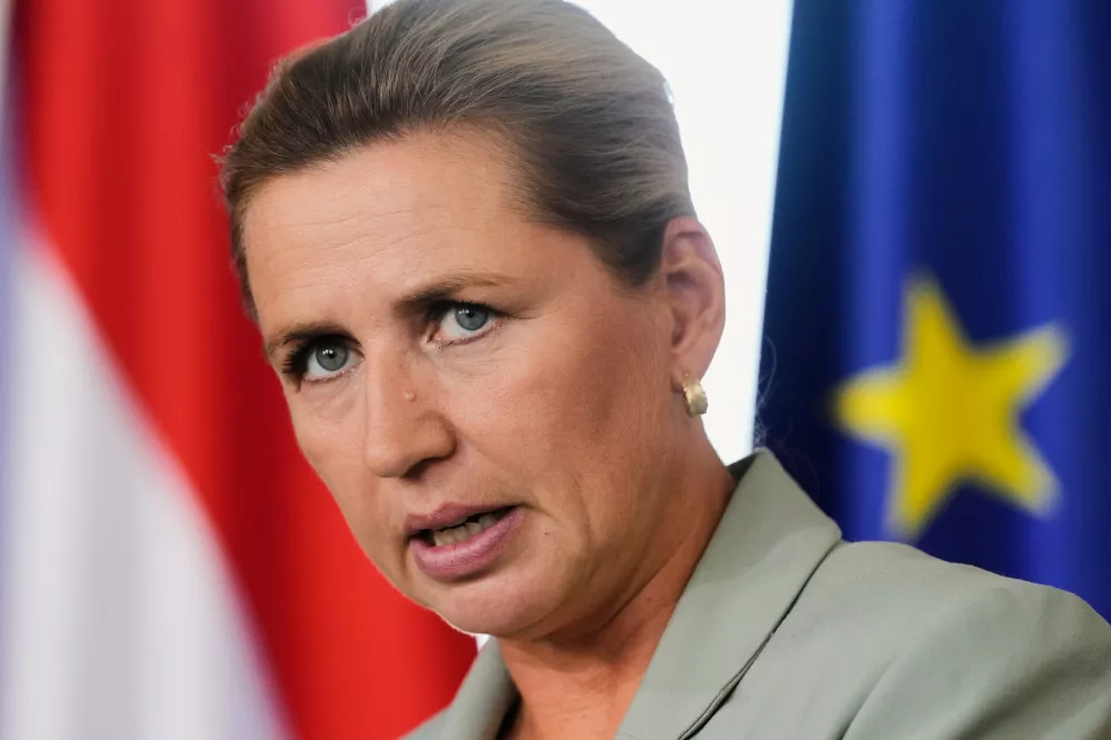 Denmark's Prime Minister Mette Frederiksen talks to the media after a meeting about an European Financial Framework at the chancellery in Berlin, Germany, Thursday, Aug. 27, 2026. (AP Photo/Markus Schreiber)