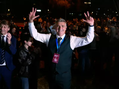 Students' List leader Ilija Srdanovic celebrates after Aleksandar Vucic, leader of the right-wing Serbian Progressive Party (SNS) conceded defeat in the parliamentary election in Belgrade, Serbia, Sunday, Oct. 25, 2026. (AP Photo/Petr David Josek)