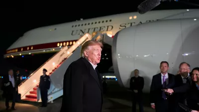 President Donald Trump speaks with reporters as he arrives on Air Force One, Wednesday, Oct. 28, 2026, at Joint Base Andrews, Md. (AP Photo/Alex Brandon)