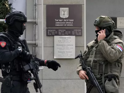 Serbian gendarmes guard the Israeli Embassy after an unidentified assailant attacked a guard with knives in Belgrade, Serbia, Wednesday, Oct. 28, 2026. (AP Photo/Darko Vojinovic)
