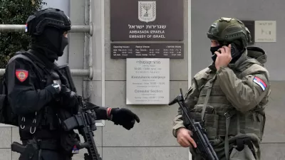 Serbian gendarmes guard the Israeli Embassy after an unidentified assailant attacked a guard with knives in Belgrade, Serbia, Wednesday, Oct. 28, 2026. (AP Photo/Darko Vojinovic)