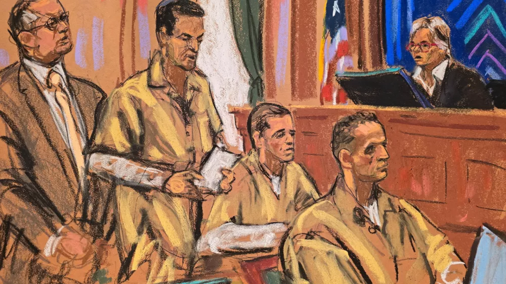 Lawyer Marc Agnifilo stands as real estate brokers Oren and Tal Alexander and their bother Alon, who were found guilty of repeatedly drugging, sexually assaulting, and raping dozens of female victims, attend their sentencing as District Judge Valerie Caproni presides at a New York courtroom in New York, US, October 27, 2026 in this courtroom sketch. REUTERS/Jane Rosenberg