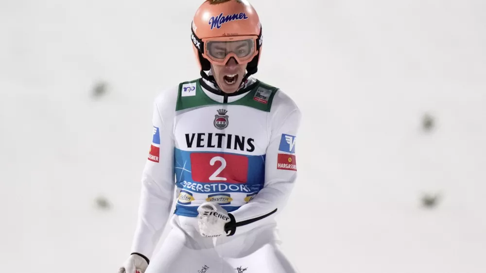 Stefan Kraft, of Austria, reacts after landing his second round jump at the first stage of the 73rd Four Hills ski jumping tournament in Oberstdorf, Germany, Sunday, Dec. 29, 2024. (AP Photo/Matthias Schrader)