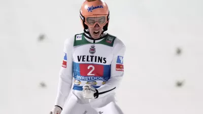 Stefan Kraft, of Austria, reacts after landing his second round jump at the first stage of the 73rd Four Hills ski jumping tournament in Oberstdorf, Germany, Sunday, Dec. 29, 2024. (AP Photo/Matthias Schrader)