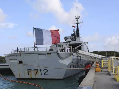 FILE - In this May 11 2017 file photo, the French stealth frigate Courbet is docked at Naval Base Guam, near Hagatna, Guam. rance is suspending its involvement in a NATO naval operation of Libya's coast after a standoff with a Turkish ship and amid growing tensions within the military alliance over Libya. France is also calling for crisis mechanism to prevent a repeat of an incident earlier this month between Turkish warships and the French naval vessel Courbet in the Mediterranean. (AP Photo/Haven Daley)