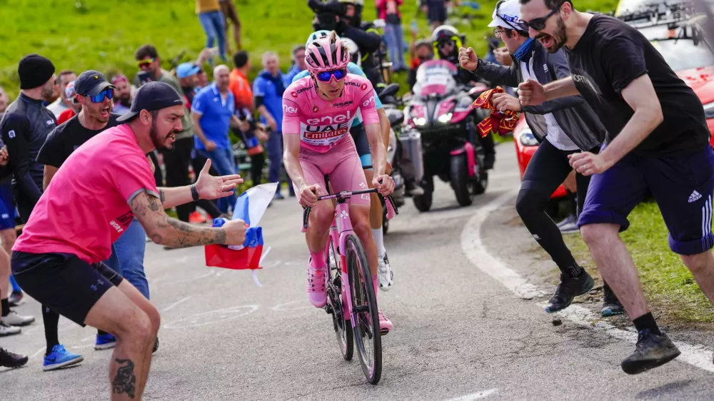 Slovenia's Tadej Pogacar, wearing the pink jersey of the race overall leader, pedals during the 20th stage of the Giro d'Italia cycling race from Alpago to Bassano del Grappa, Italy, Saturday, May 25, 2024. (Fabio Ferrari/LaPresse via AP)