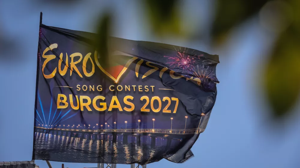 FILE - An Eurovision flag flies at the port of Burgas, on Bulgaria's Black Sea coast, which will host the 71st Eurovision Song Contest in 2027, Friday, Aug. 14, 2026. (AP Photo/Valentina Petrova, File)
