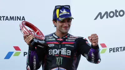 FILE PHOTO: MotoGP - Indonesian Grand Prix - Mandalika International Street Circuit, Mandalika, Indonesia - October 11, 2026 Third place Aprilia Racing's Jorge Martin celebrates on the podium with a trophy after the MotoGP race REUTERS/Willy Kurniawan/File Photo