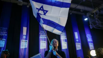A supporter of former military chief Gadi Eisenkot, leader of the Yashar party, reacts to the exit poll at his party headquarters, on the evening of Israel's national election, in Tel Aviv, Israel October 27, 2026. REUTERS/Shir Torem