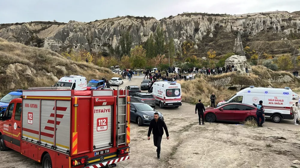 A fire truck and ambulances are parked near the scene after rocks fell from a fairy chimney, a volcanic rock formation, following heavy rainfall in Goreme, in central Cappadocia region, Turkey, October 29, 2026. Ihlas News Agency via REUTERS ATTENTION EDITORS - THIS PICTURE WAS PROVIDED BY A THIRD PARTY. NO RESALES. NO ARCHIVES.TURKEY OUT. NO COMMERCIAL OR EDITORIAL SALES IN TURKEY.
