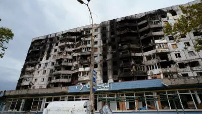 A residential building damaged from Russian attacks is seen during a local ceasefire related to a humanitarian aid mission in Oleshky, in Kherson, Ukraine, Thursday, Oct. 29, 2026. (AP Photo/Evgeniy Maloletka)