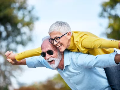 portrait of happy smiling senior couple outdoors