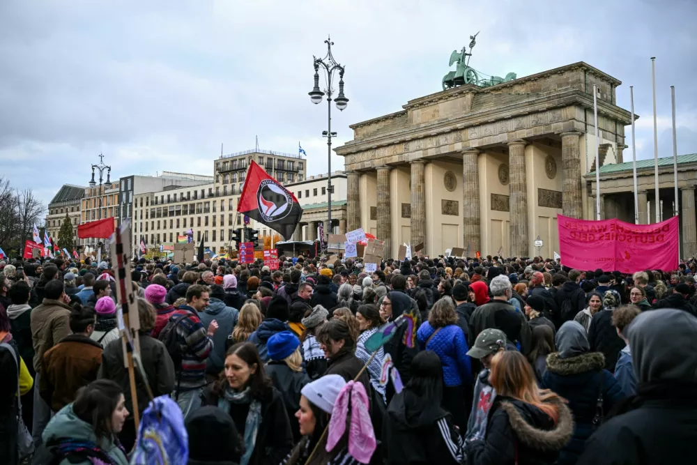 People gather at Brandenburg Gate during a nationwide protest by campaign group Gen Z regelt (Gen Z takes charge) against underfunding of schools, cuts to education, social services, culture and healthcare, rising living costs, and military conscription, in Berlin, Germany, October 31, 2026. REUTERS/Annegret Hilse